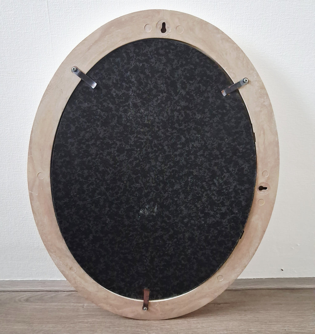Oval wall mirror with etched flamingos design