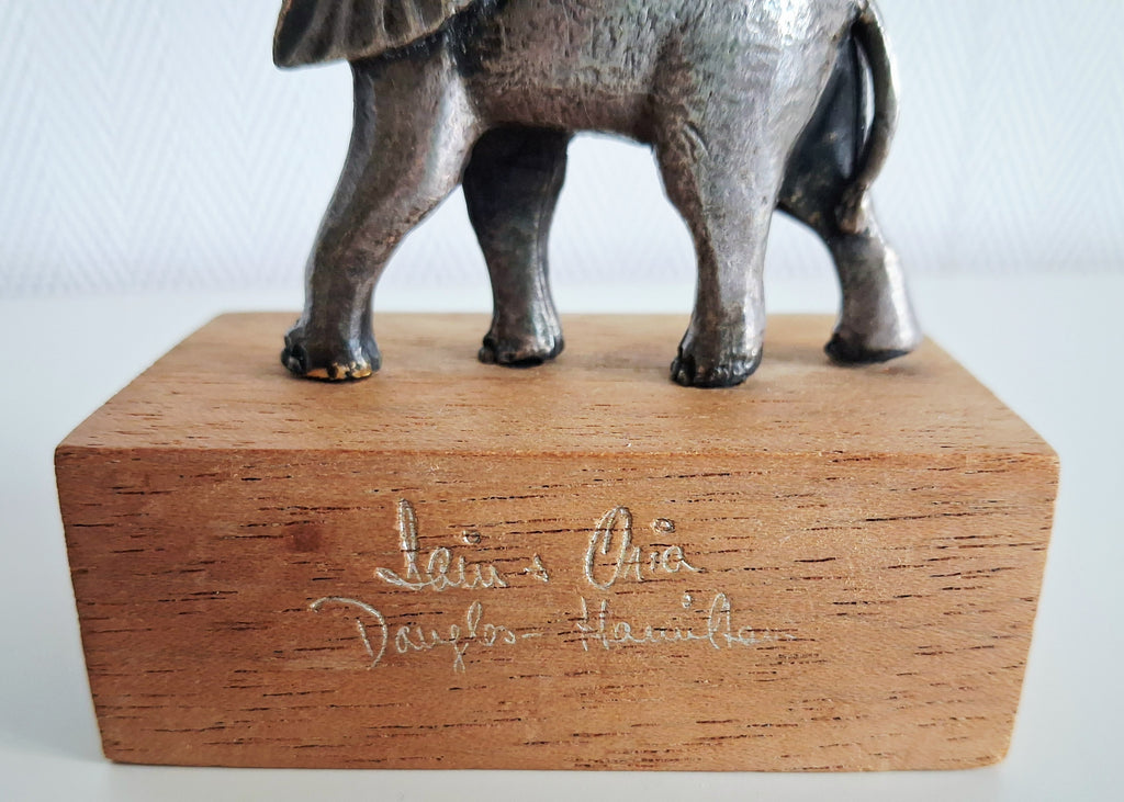 Silver plated elephant figurines on wooden bases, Wereld Natuur Fonds (WWF) collectible set