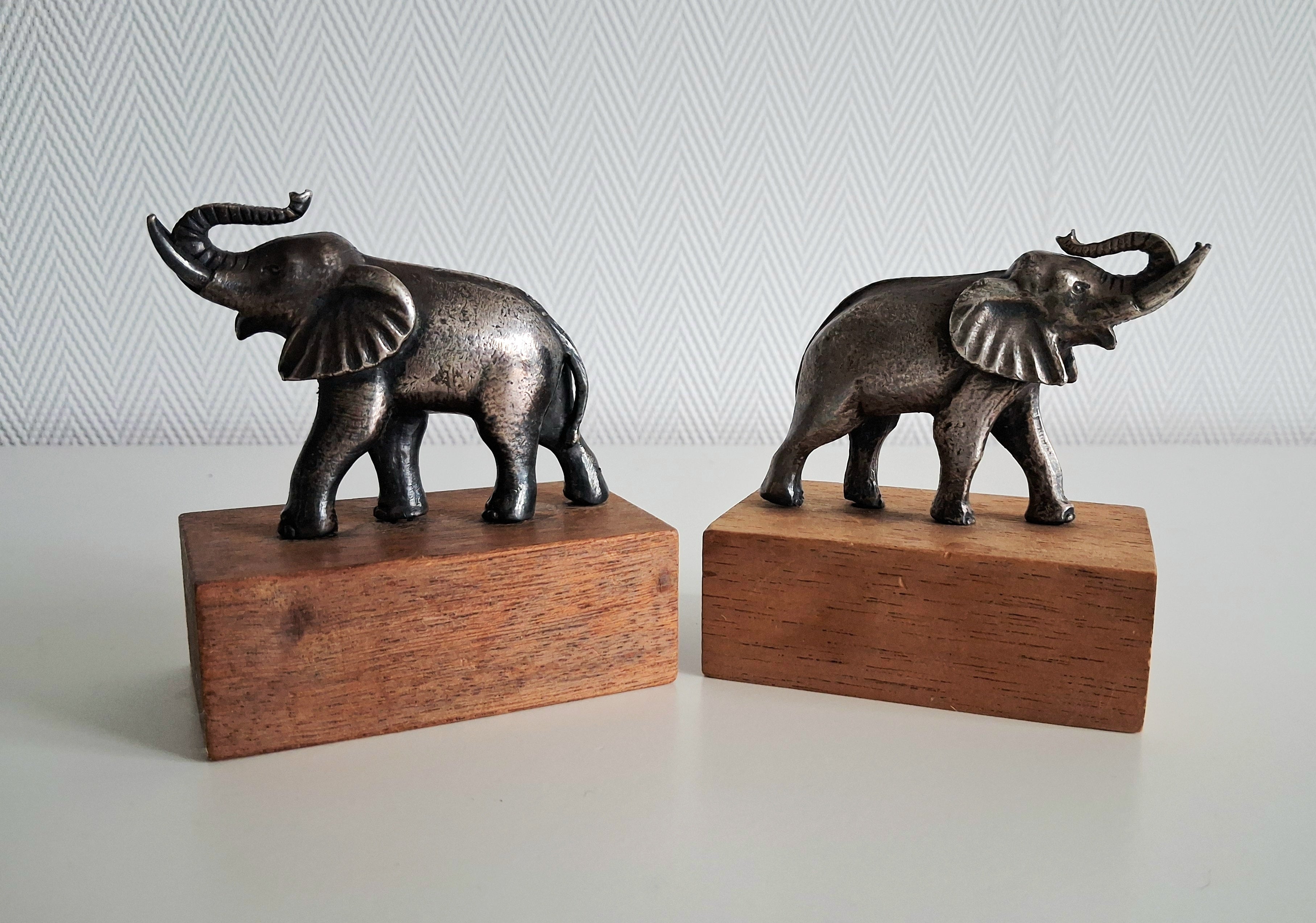Silver plated elephant figurines on wooden bases, Wereld Natuur Fonds (WWF) collectible set