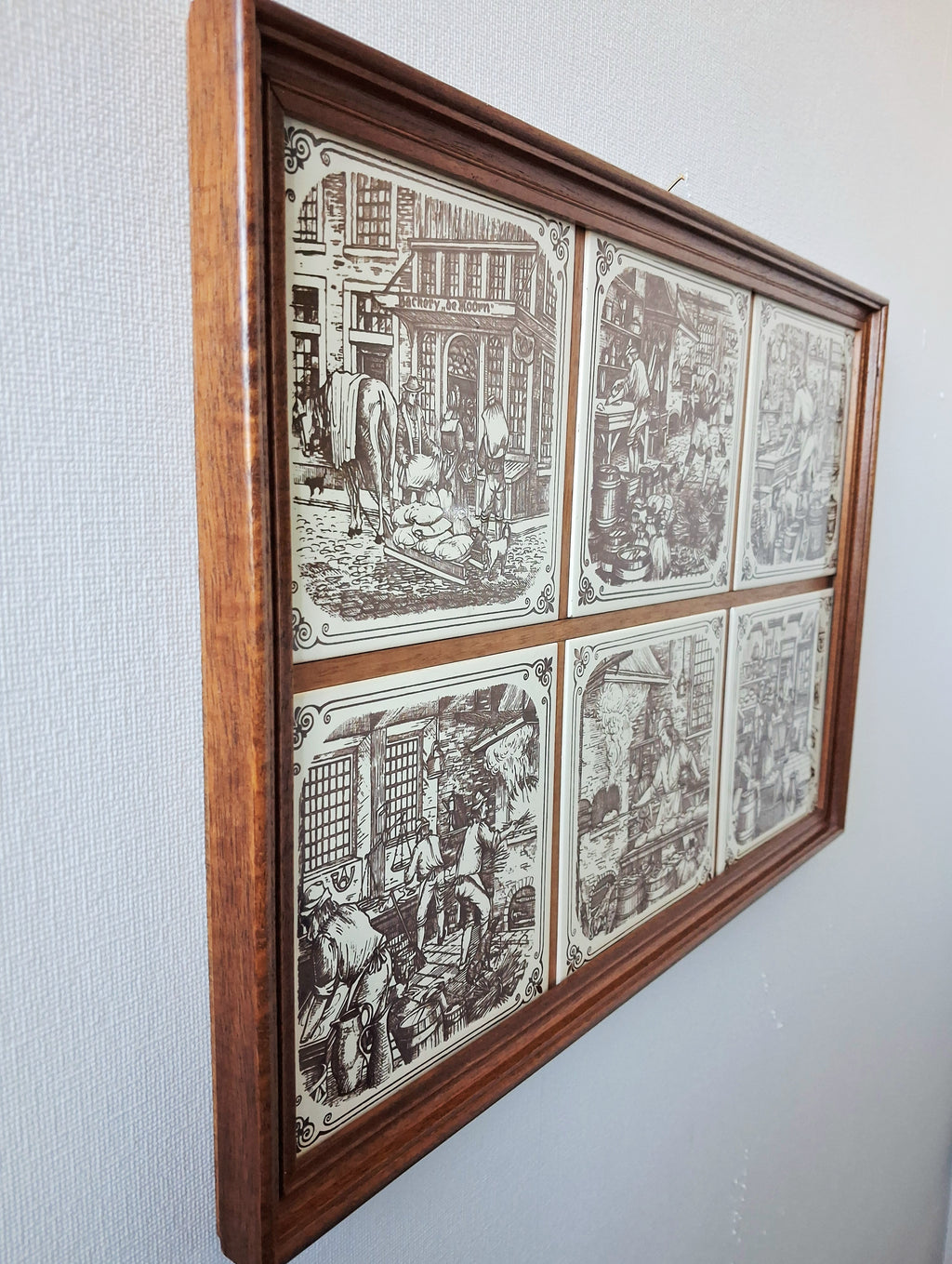 Vintage dutch ceramic tile panel “Old Dutch Crafts” in wooden frame, Brinkers Zoetermeer Netherlands mid-20th century