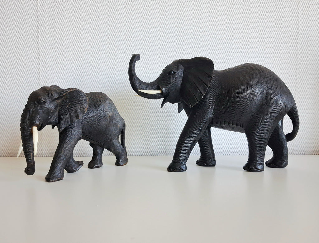 Set of two wooden elephant figurines