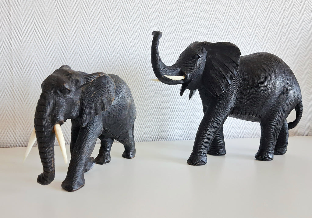 Set of two wooden elephant figurines