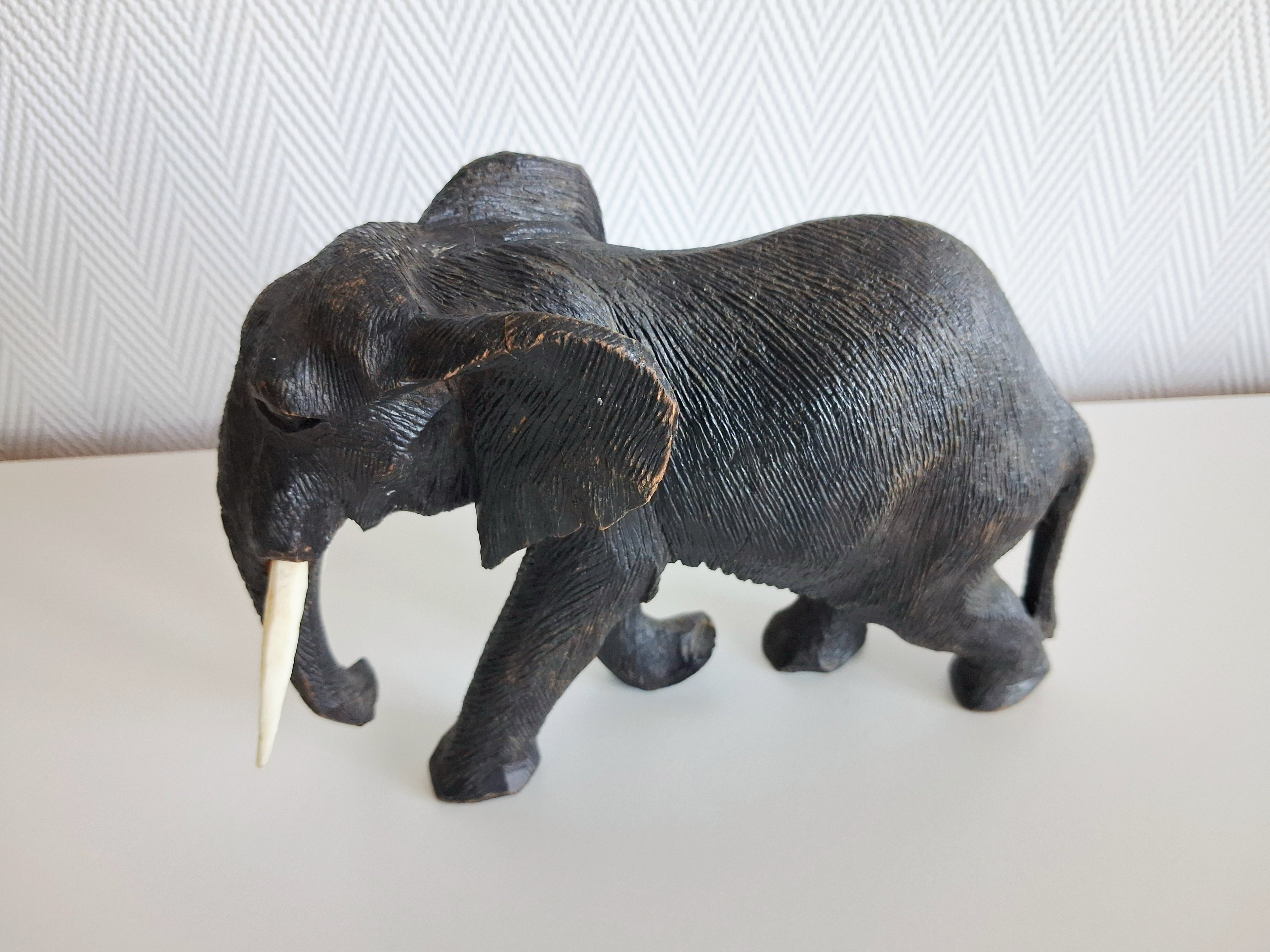 Set of two wooden elephant figurines