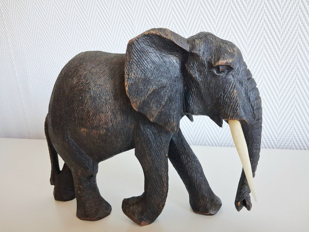 Set of two wooden elephant figurines
