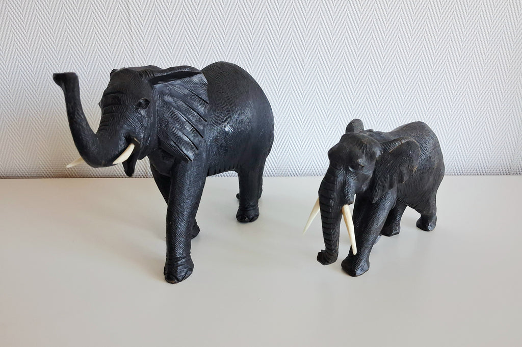 Set of two wooden elephant figurines