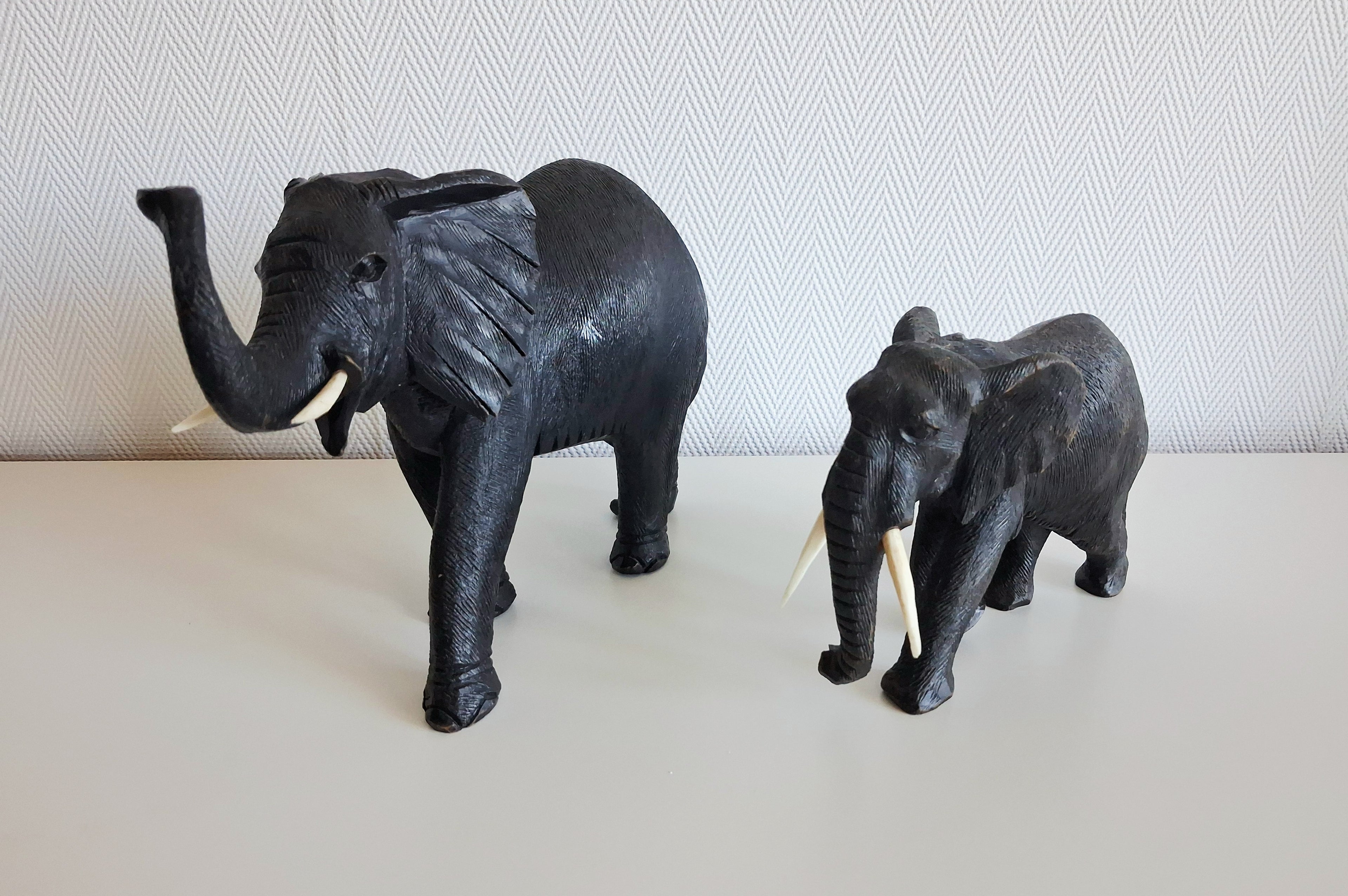 Set of two wooden elephant figurines