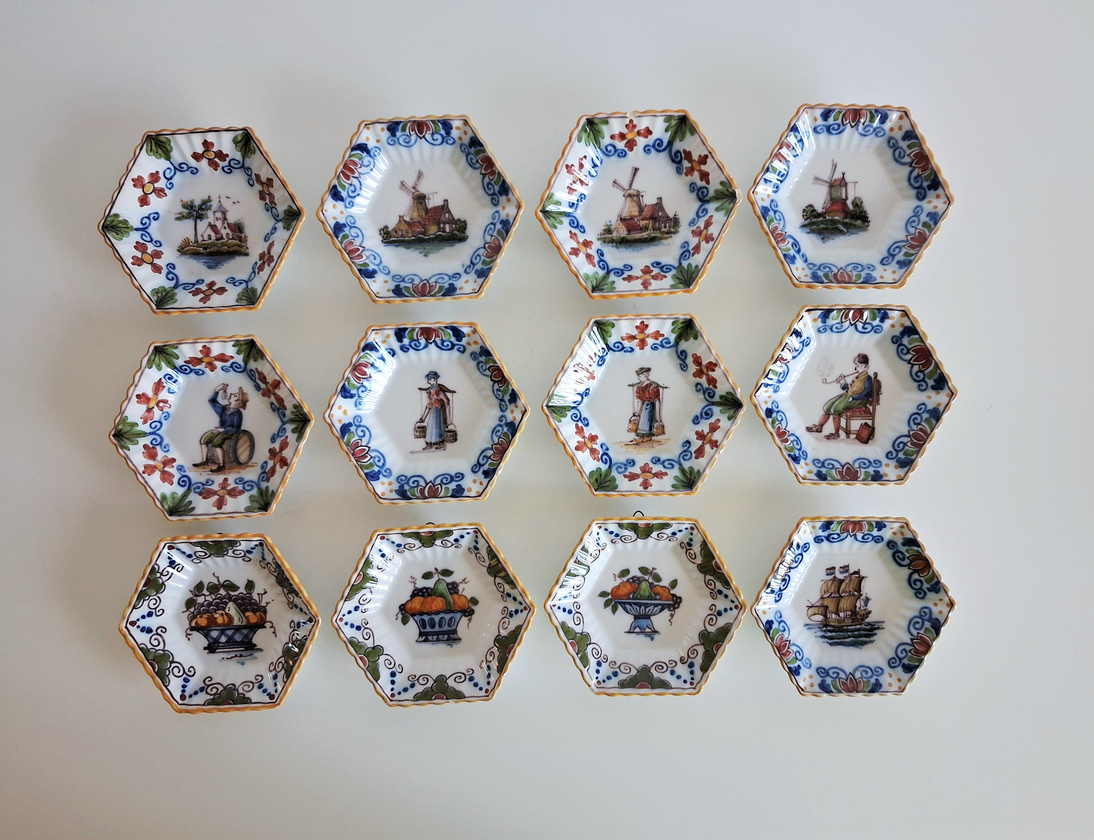 Set of 12 hand-painted miniature Makkum wall dishes, Royal Tichelaar Holland