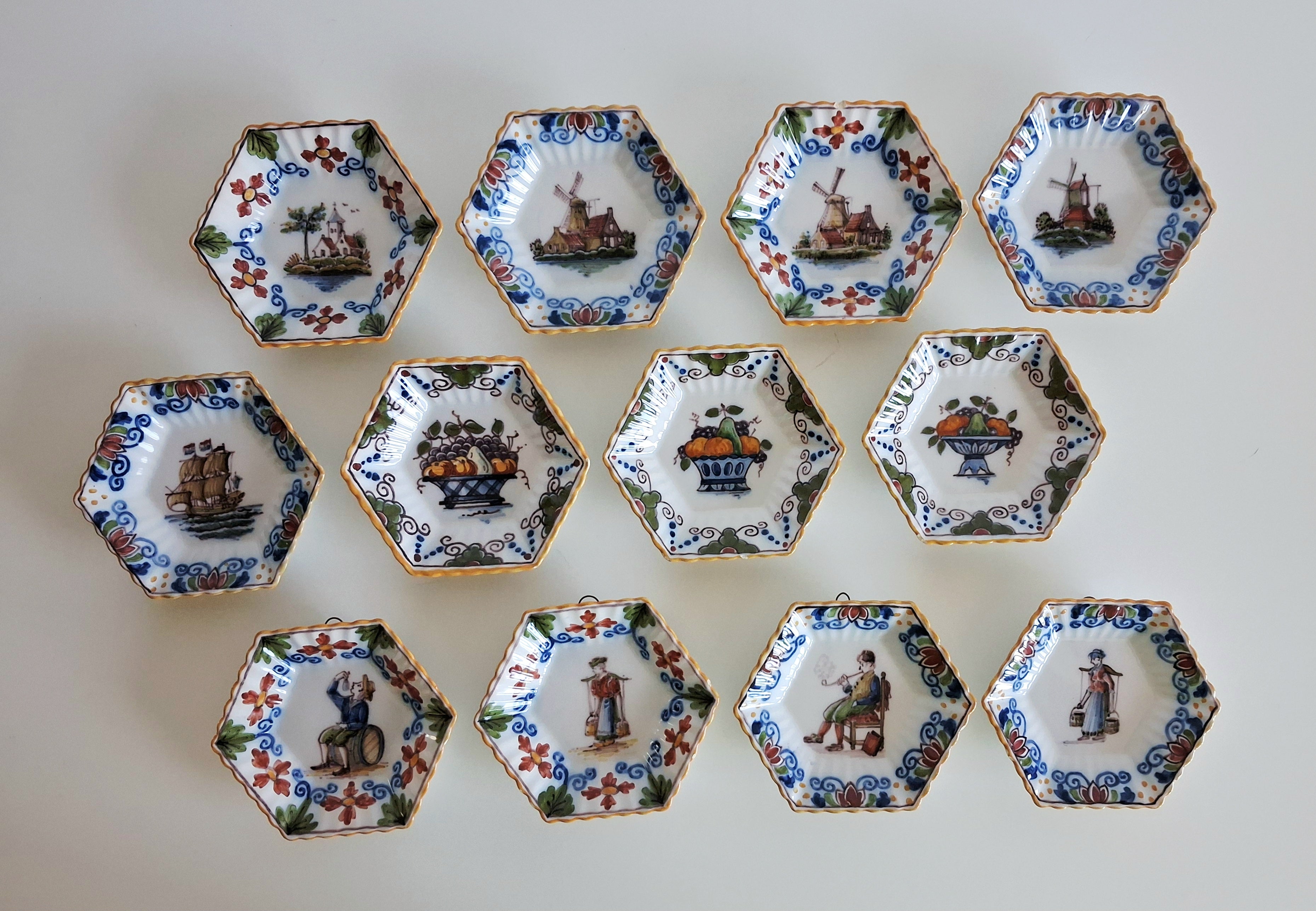 Set of 12 hand-painted miniature Makkum wall dishes, Royal Tichelaar Holland