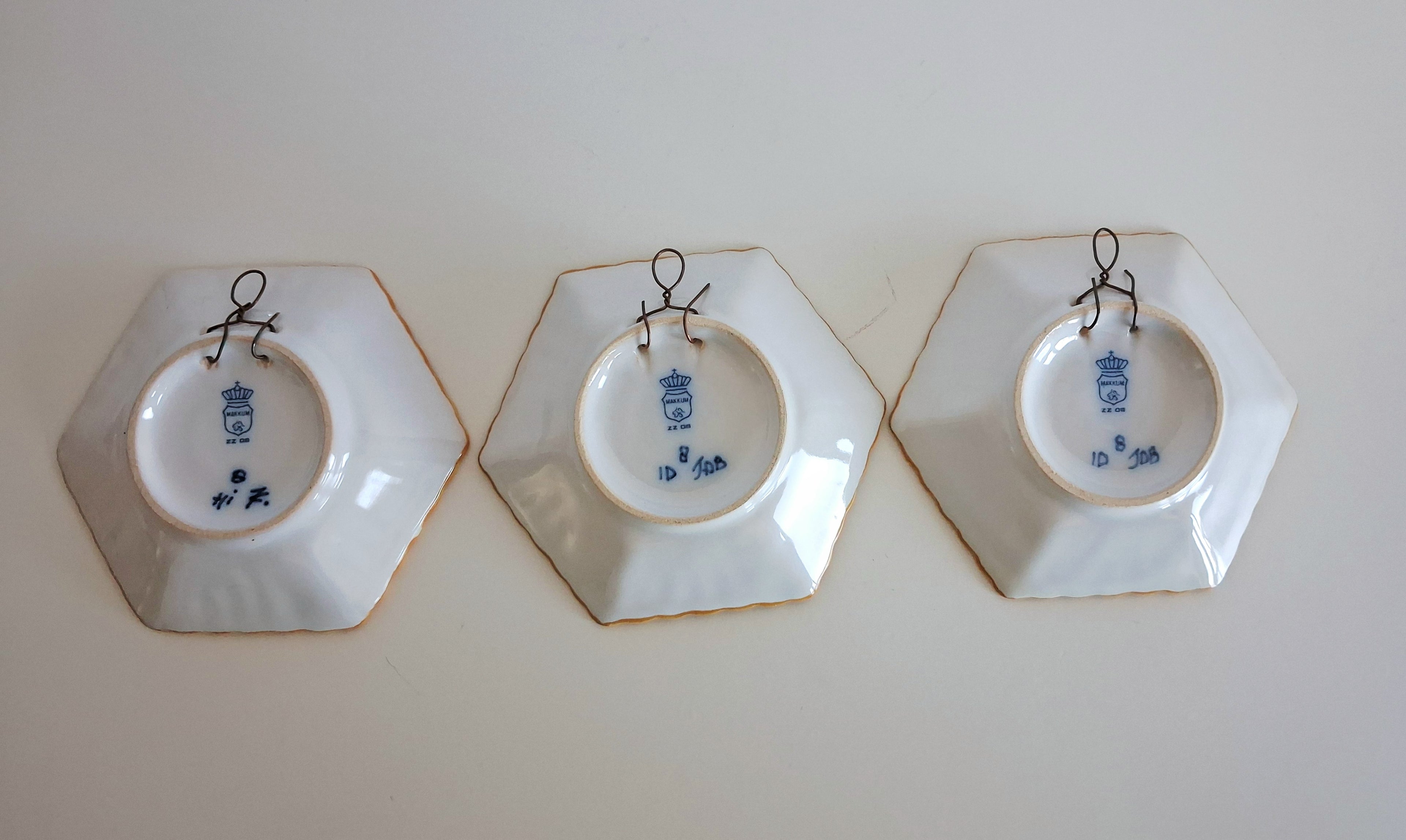 Set of 12 hand-painted miniature Makkum wall dishes, Royal Tichelaar Holland