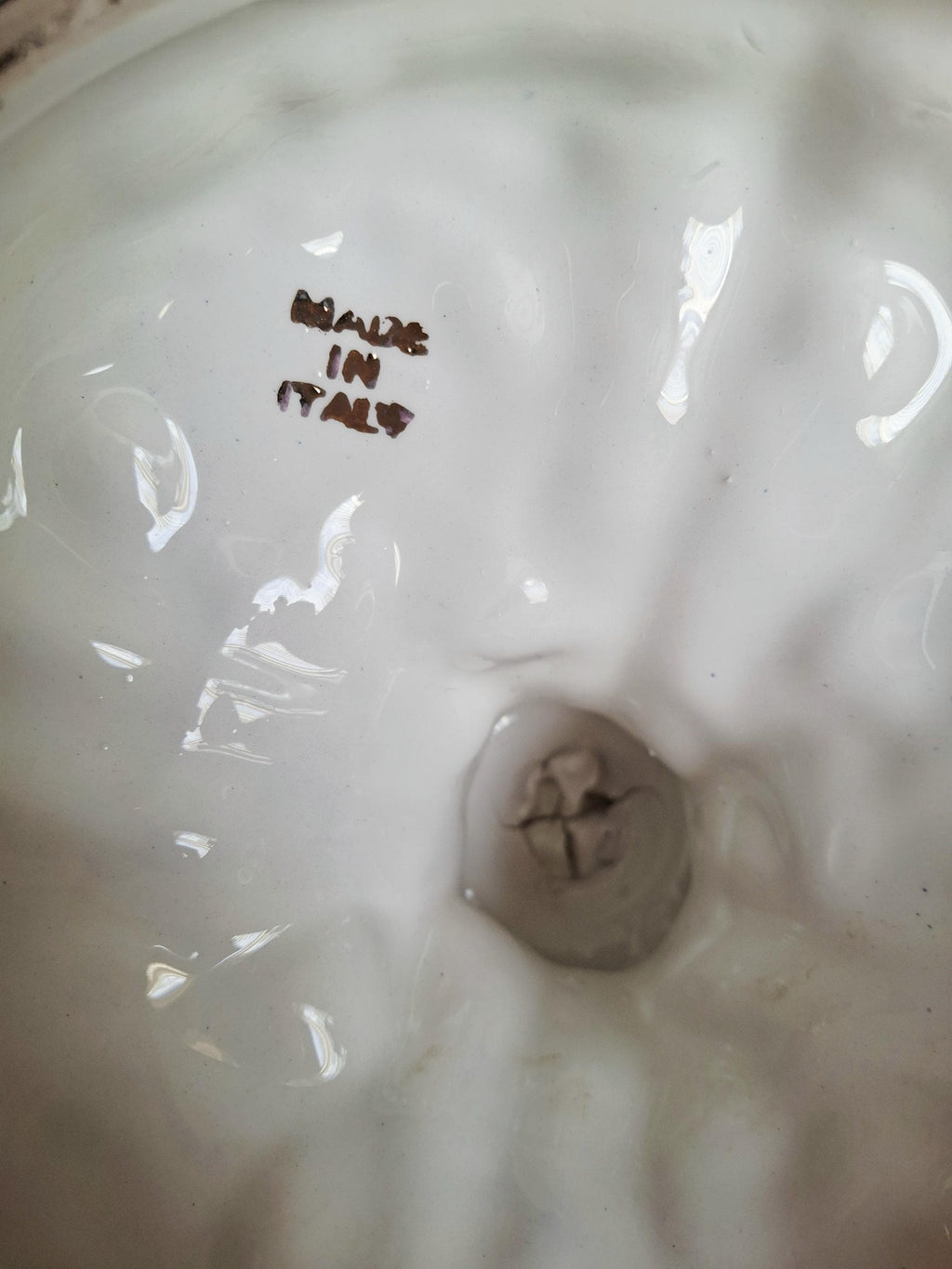 Italian rococo revival lidded vase with floral reliefs and gold accents