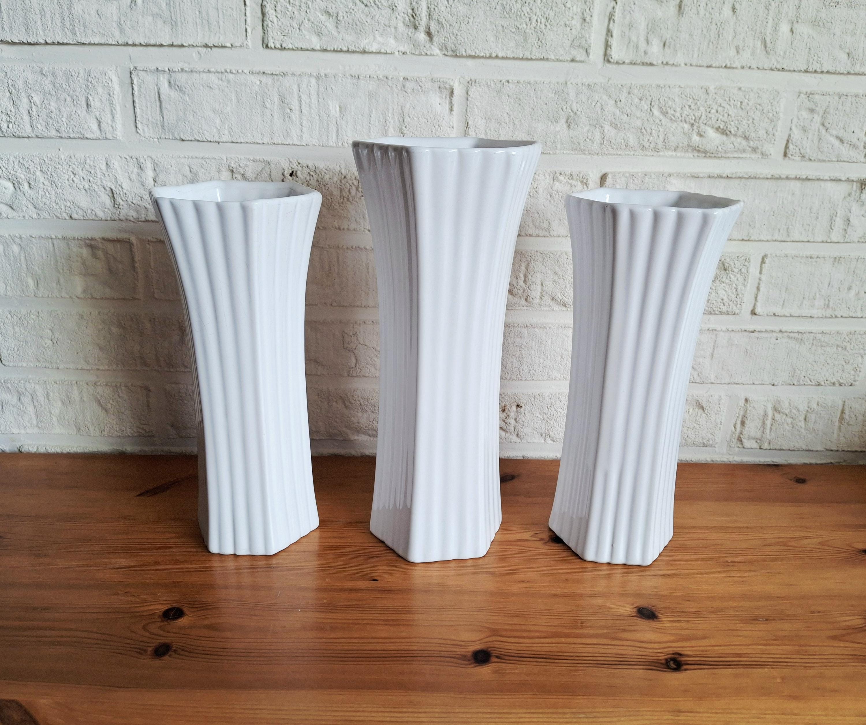 Set of three Delfts Wit white vases