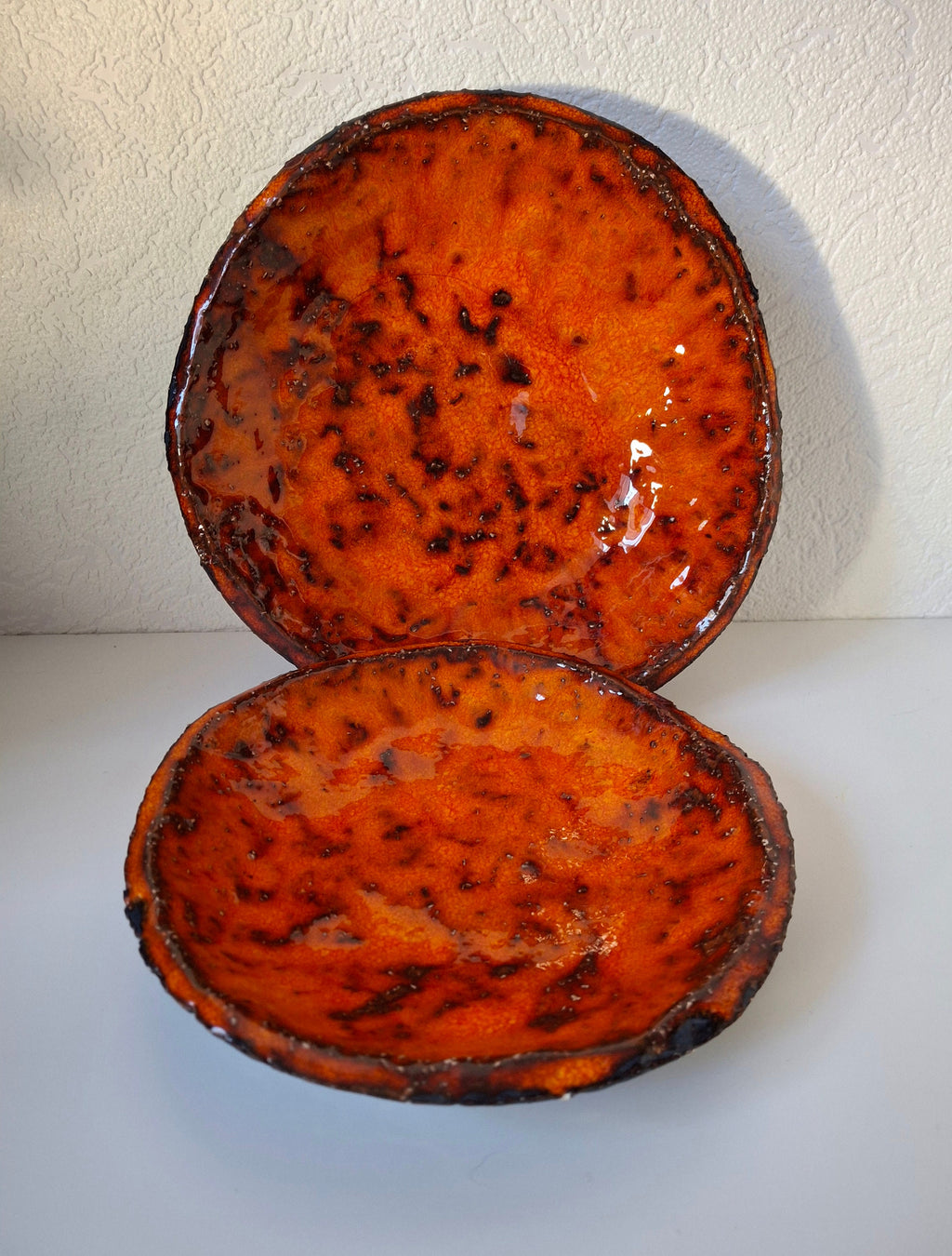 Vintage 1960s orange glazed bowls, Dutch pottery