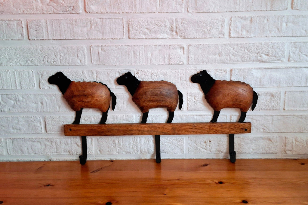 Wooden shaped sheeps with metal hooks, Vintage wooden and black metal coat hangers