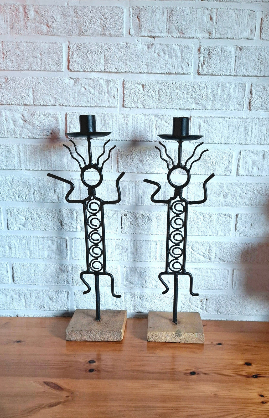 Pair of vintage figurative candlesticks