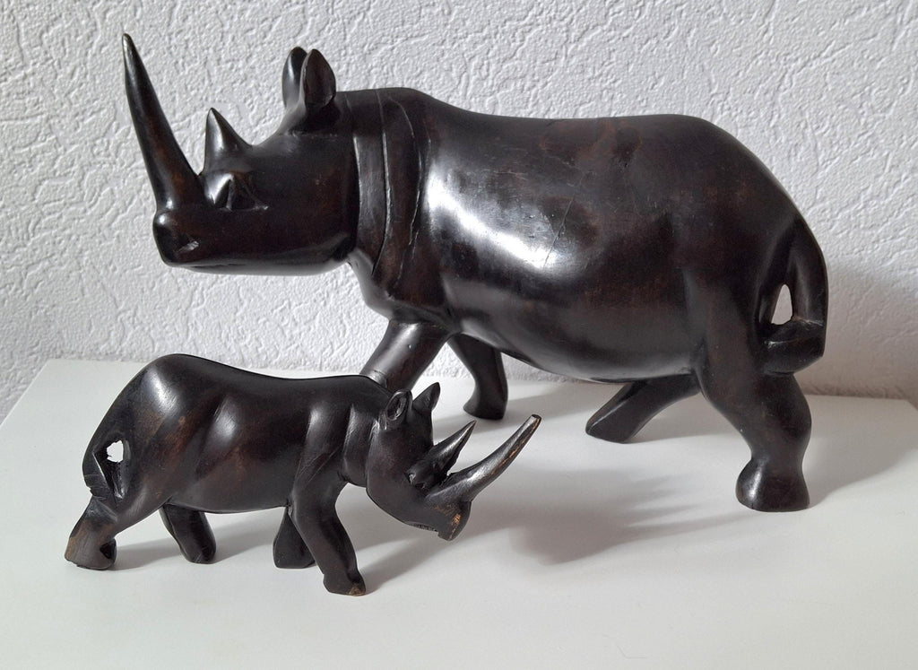 Three African ebony wooden rhino sculptures
