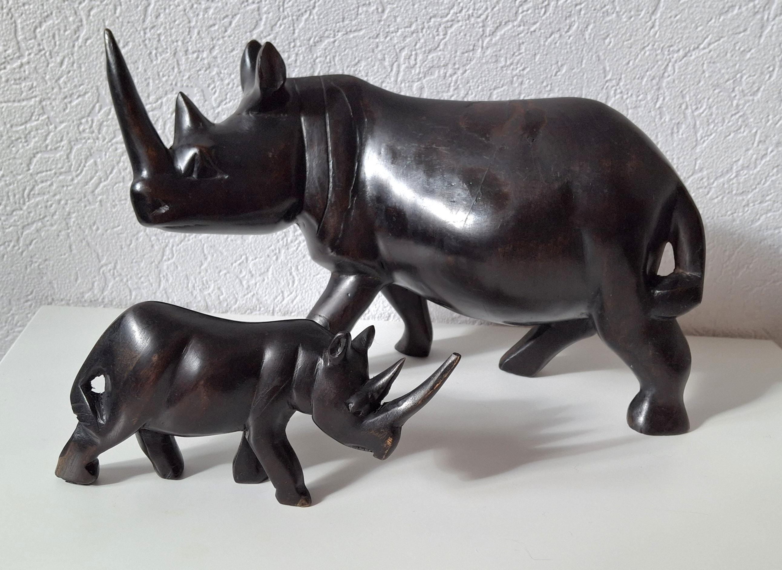 Three African ebony wooden rhino sculptures