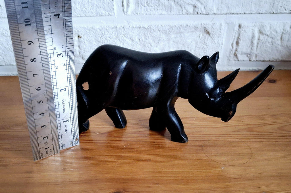 Three African ebony wooden rhino sculptures