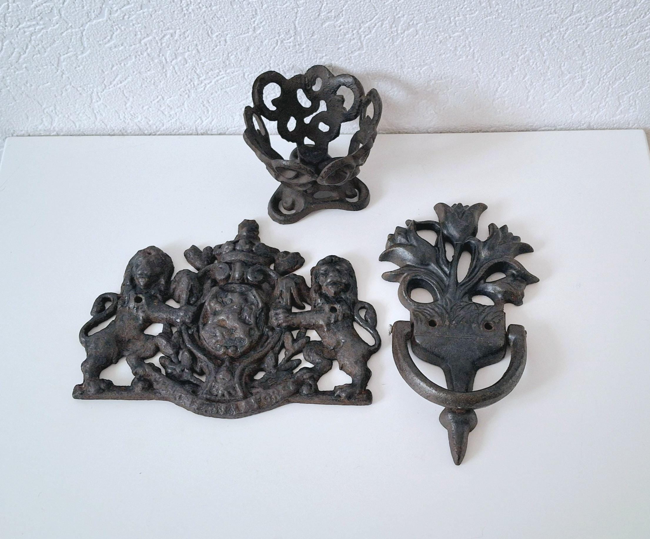 Cast iron door knocker tulip, metal candle holder, antique lions plaque featuring