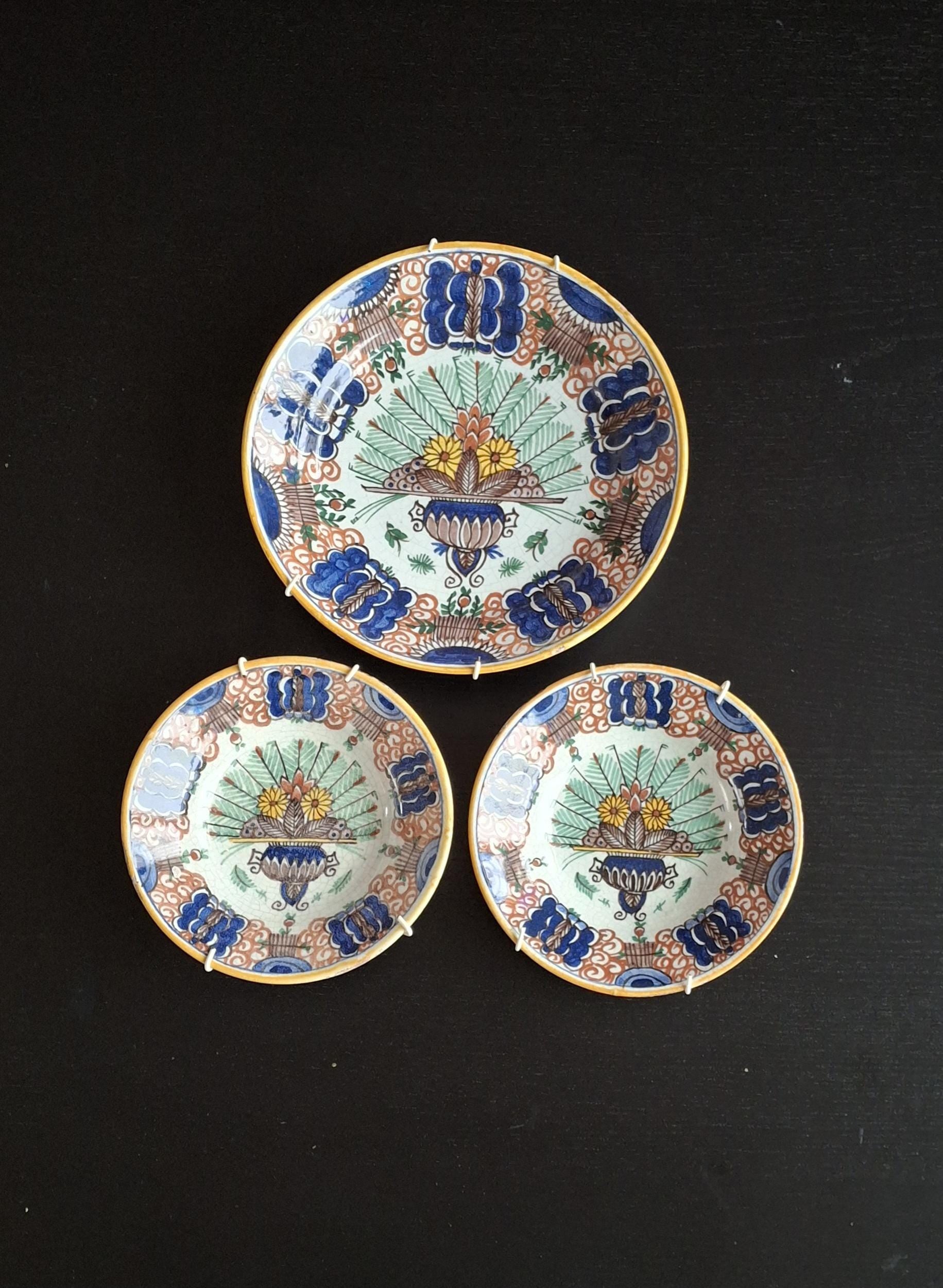 Antique peacock wall plates, 19th century Delftware