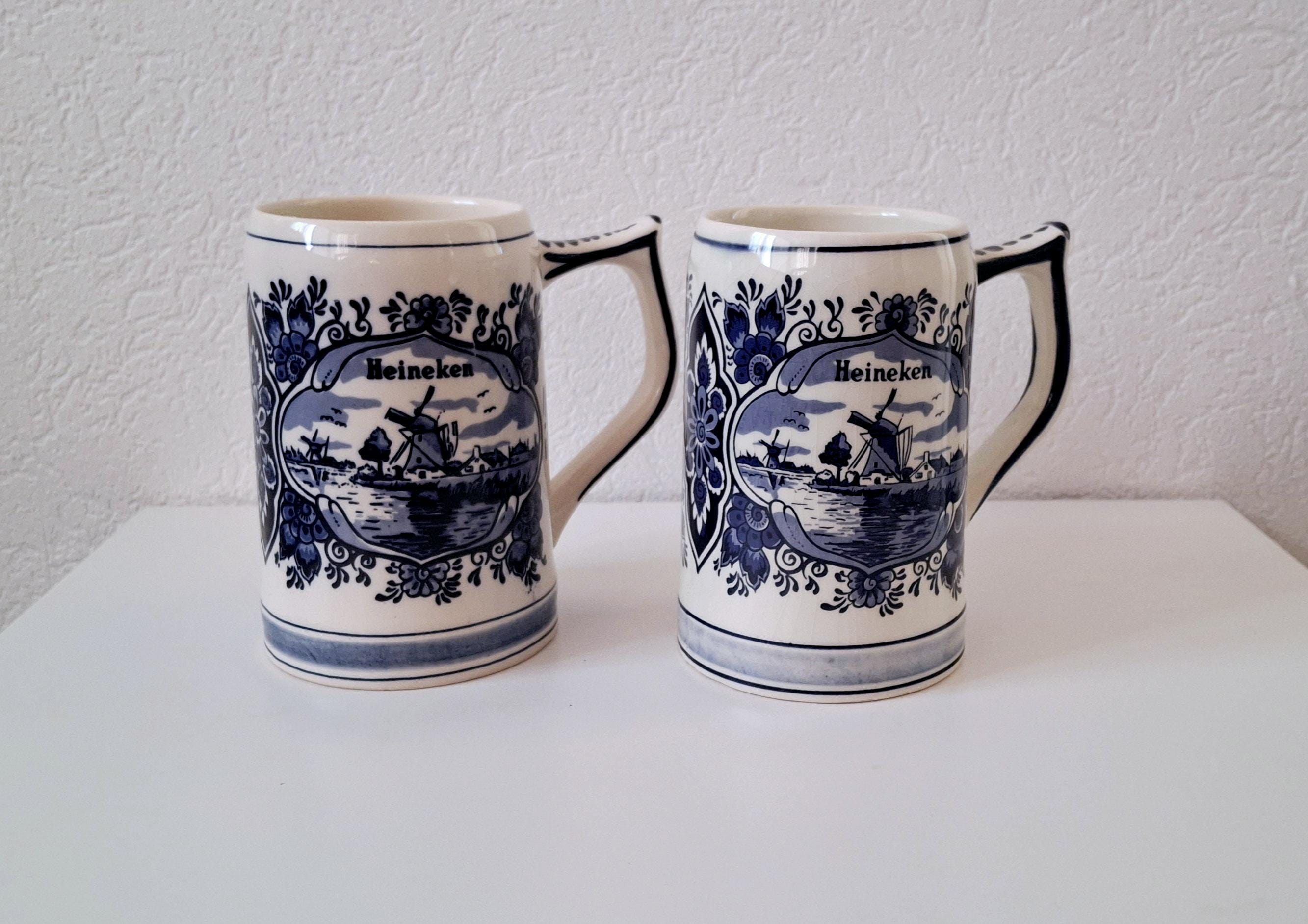 Pair of vintage Heineken Delft Blue beer mugs, Dutch beer steins