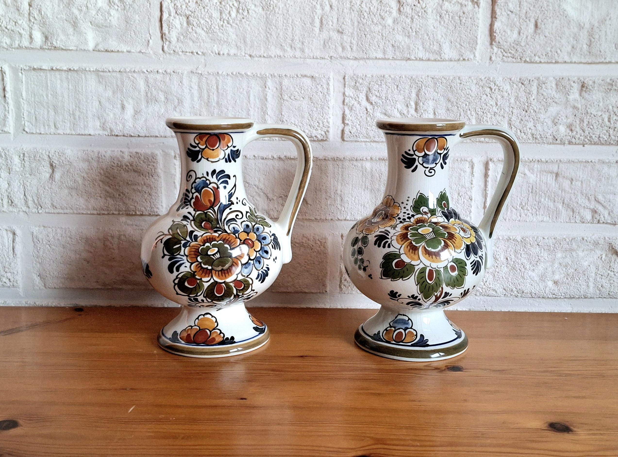 Pair of Delft Polychrome jugs, set of two Delft pitchers