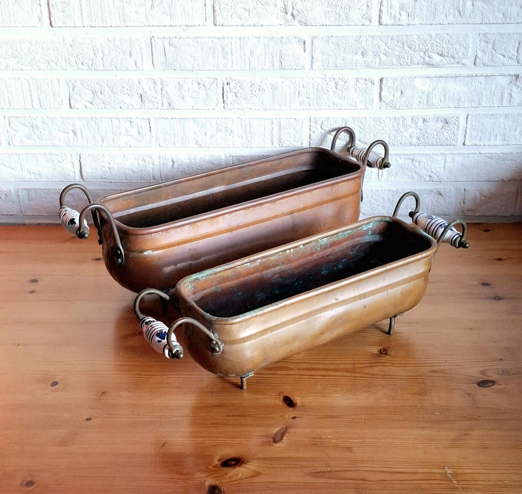 Two antique dutch copper planters, Hand wash bowl with Delft Porcelain Handles