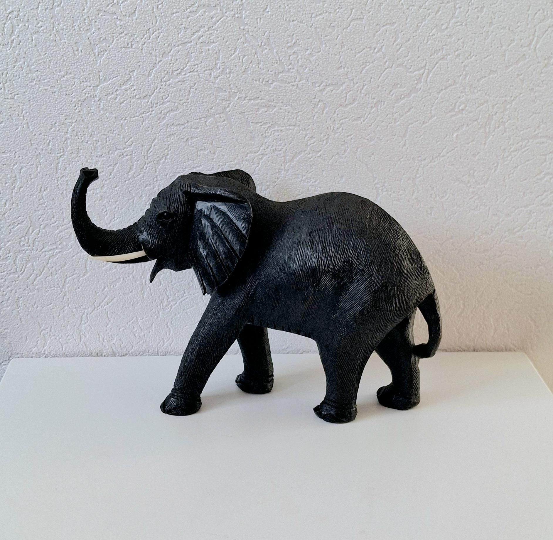 Hand-carved wooden elephant figurine