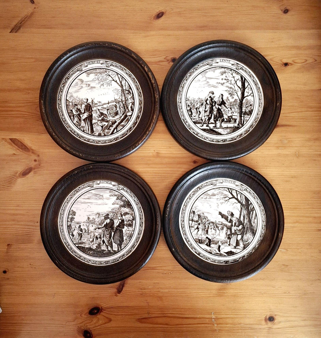 Set of 4 seasonal ceramic tiles in round wooden frames