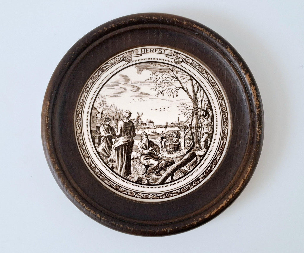 Set of 4 seasonal ceramic tiles in round wooden frames