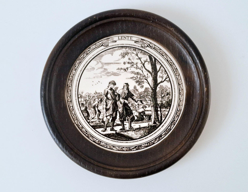 Set of 4 seasonal ceramic tiles in round wooden frames