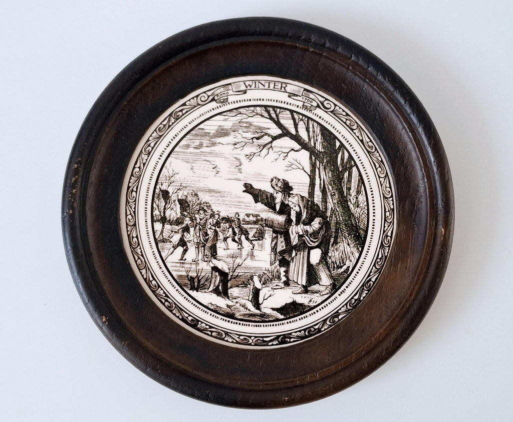 Set of 4 seasonal ceramic tiles in round wooden frames