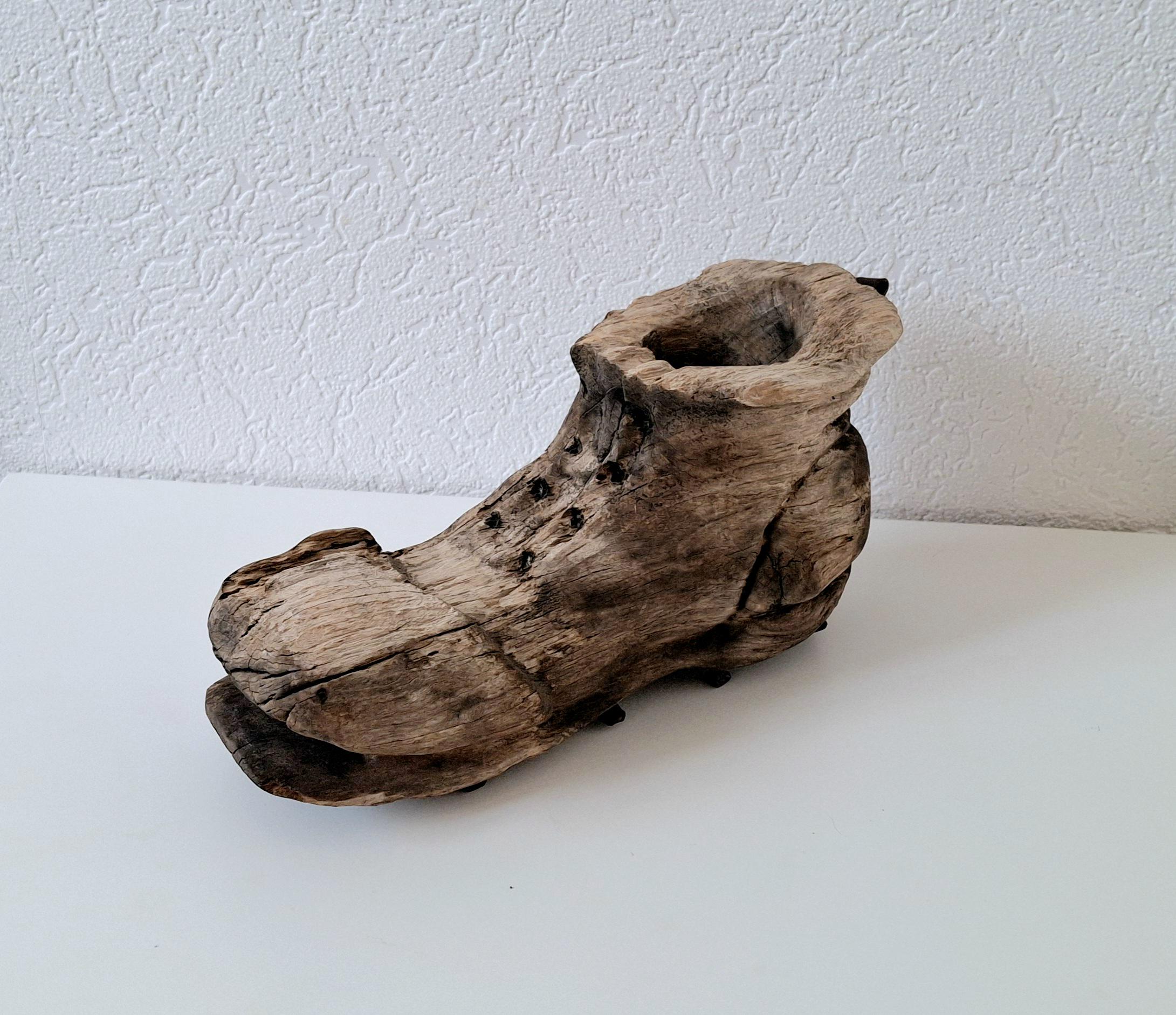 Rustic hand-carved wooden shoe, Vintage folk art with forged nails