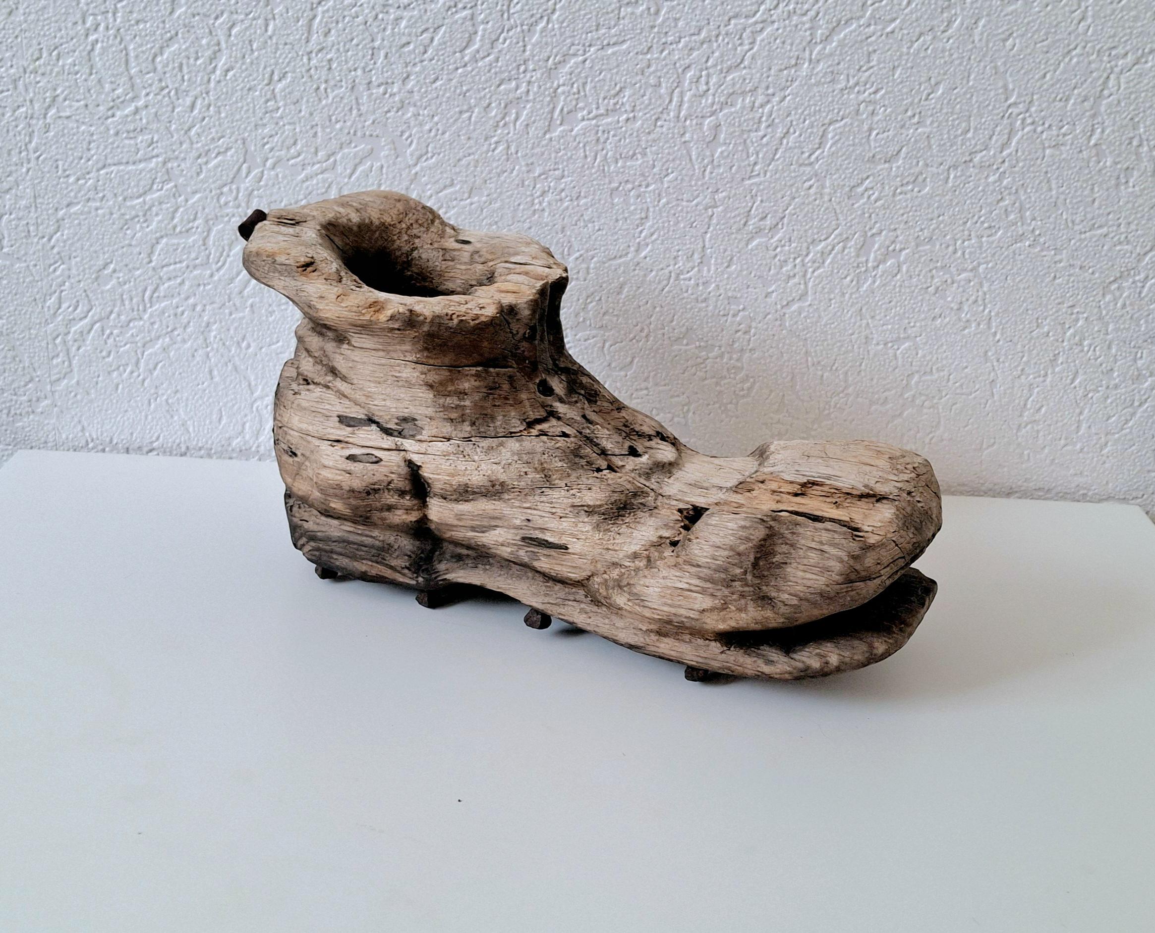 Rustic hand-carved wooden shoe, Vintage folk art with forged nails